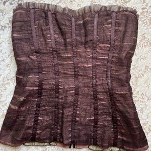 Cute ruffled corset top.